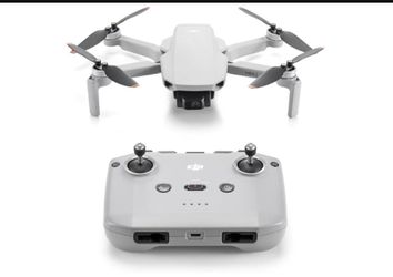 DJI Mini 2 SE Fly More Combo, Mini Drone with 10km Video Transmission, 3 Batteries for 93 Mins Max Flight Time, Under 249g, QHD Video, Auto Return to