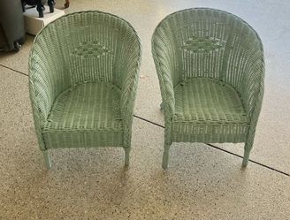 Two small vintage teal color Childs wicker chairs