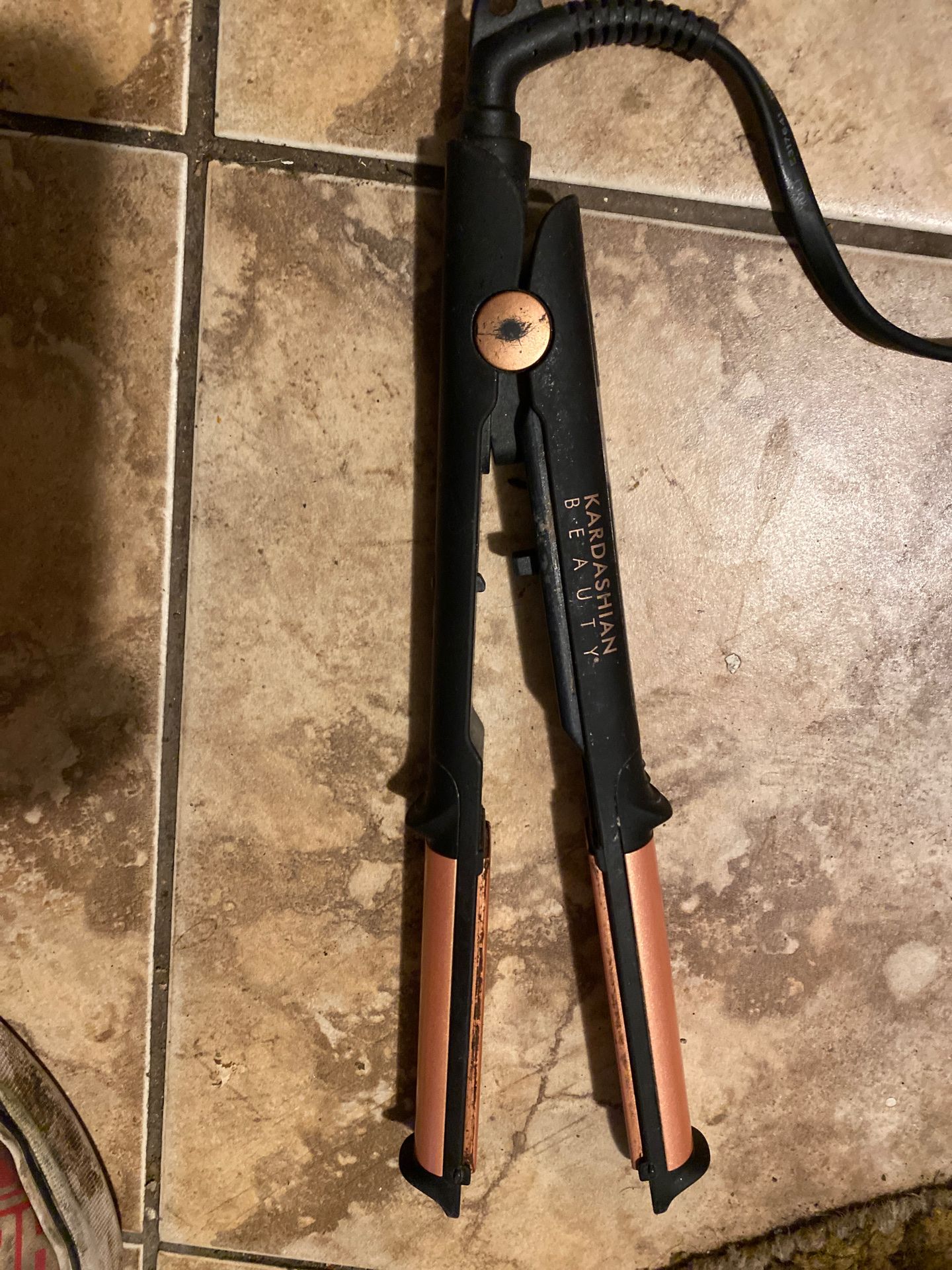 Lots of flat irons and hair curlers 70 for all