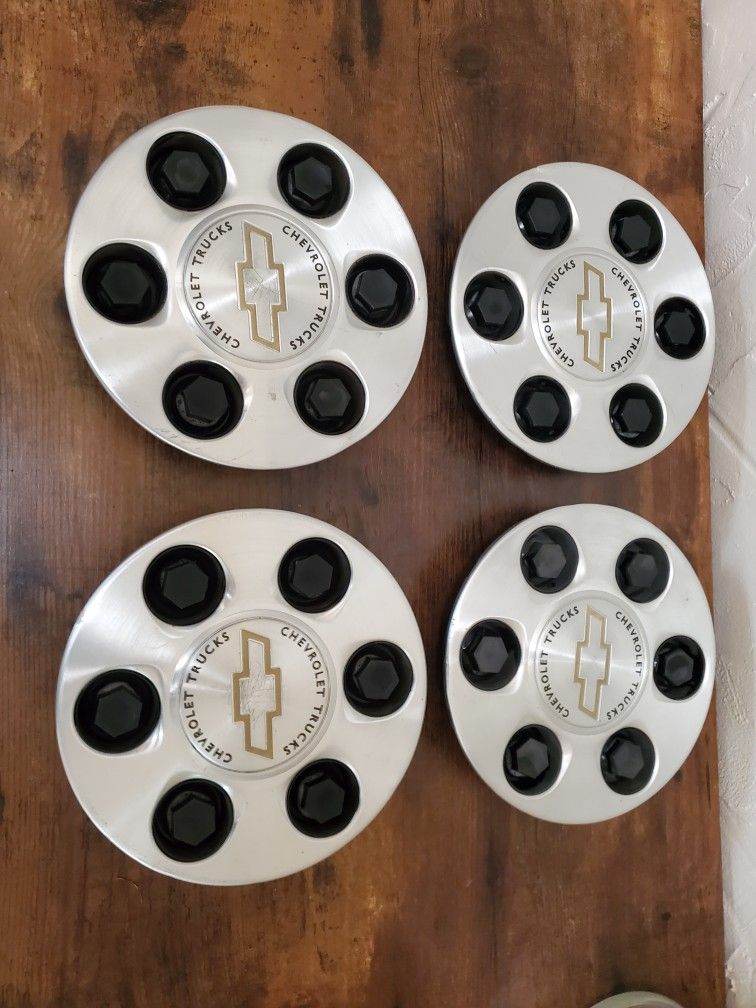 oem chevy 17" alloy wheel center caps, set of 4. part number 1(contact info removed).