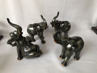 Resin green color elephants $ 12 each