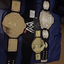 Authentic Wrestling N UFC Championship Belts