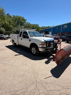Ford F-350 Utility Truck with Snow Plow