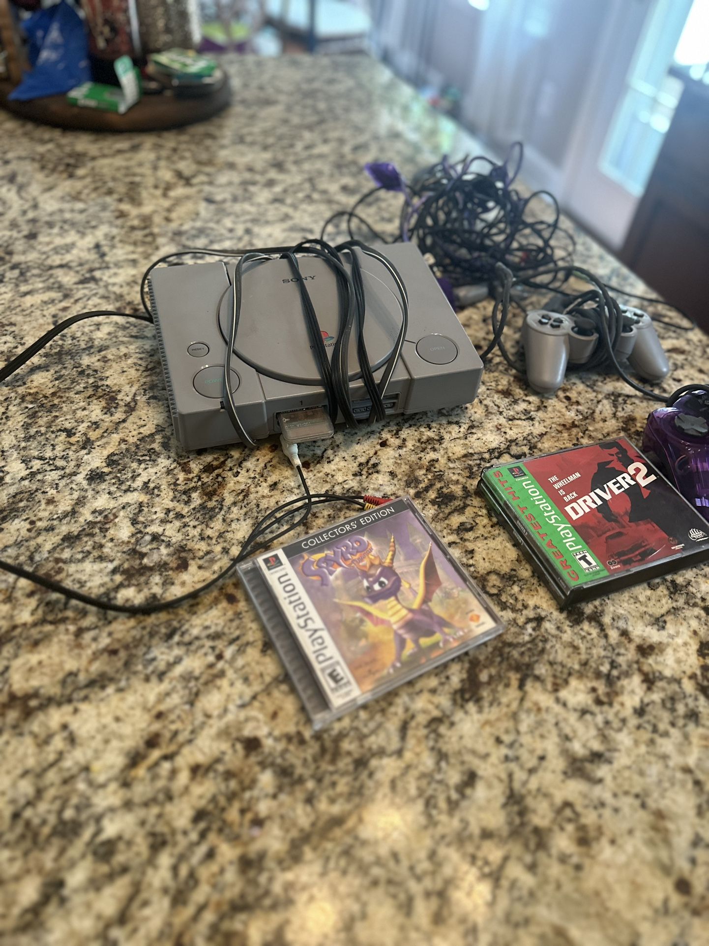 Original Ps1 with 2 Controllers, Driver 2, and Spyro The Collectors Edition