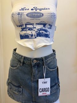 Top size Medium skirt size 3/26 both new $10 each or $20 for the outfit