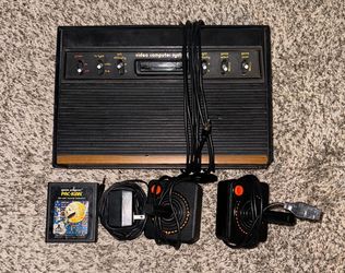 ATARI 2600 CONSOLE WITH VIDEO GAME & CONTROLLER