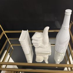 3 White ceramic decorative sculptures, "thumbs-up" hand sign, a bookend, and a bottle Piggy Bank