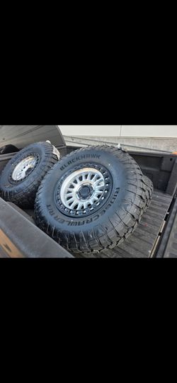 17" KMC w/ 35" RT tires. $1900