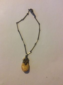 Antique gold filled elk ivory pendant and chain. 150 obo