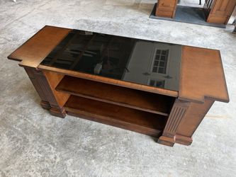 Glass top entertainment center with end storage