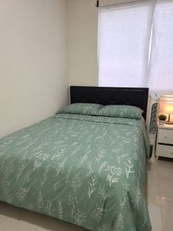 Queen Bed with Black Tufted Headboard