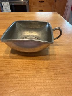 Vintage pewter square dish with handle.