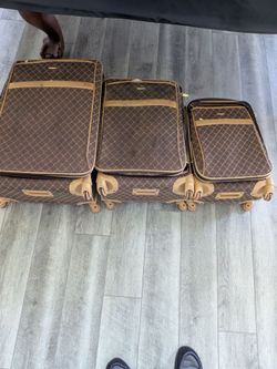 3 suit cases $60