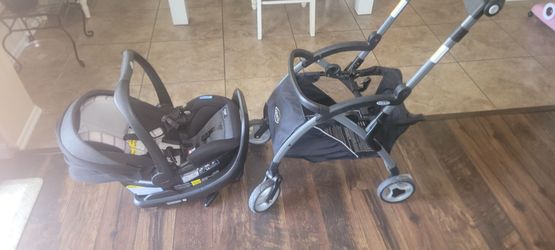 BABY CAR SEAT WITH STROLLER ATTACHMENT.