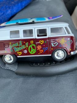 Die cast VW microbús with surfing table on the top