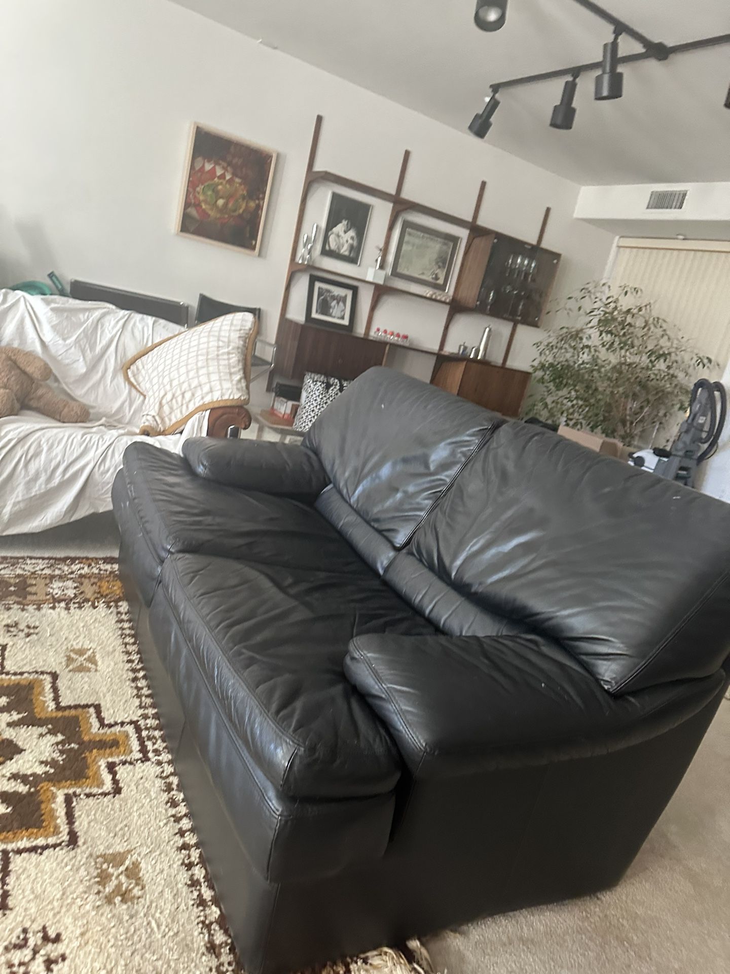 Genuine Italian MCM mid century leather couch guys this is not a cheap one. This is authentic from 1970s. It was my fabulous mother-in-law’s