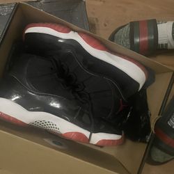 the black/red Jordan 11s 