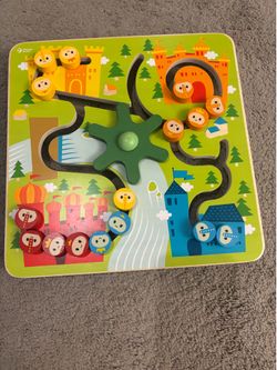 Colorful wooden maze toy by Classic World.