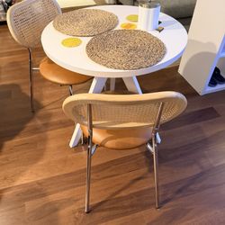 Small West Elm Tripod Dining Table in White Lacquer & Faux Leather Wicker-Backed Chairs