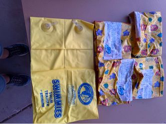 3  New pairs of children floaties all for