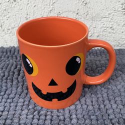 Halloween Orange Pumpkin Face Coffee Mug.