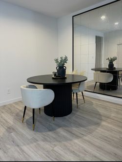 Black round dining table