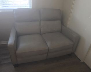 All leather taupe fully reclining Loveseat