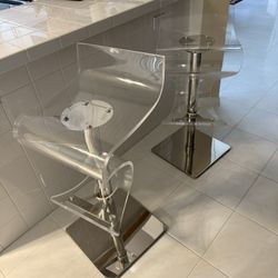 AVAILABLE 2 Swivel Clear Bar Stools Used 