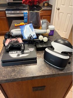 PlayStation 4 with VR system 2 controllers
