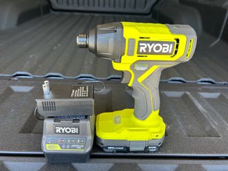 Brand new Ryobi Impact drill, battery, and charger.