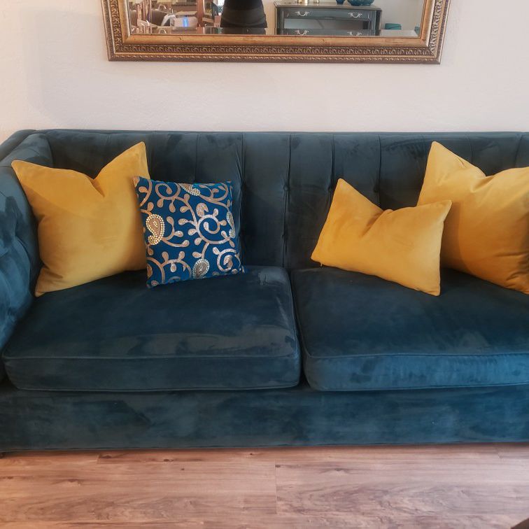 Blue Velvet Couch / Sofa With Yellow Pillows 