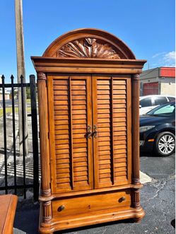 Wood  with Shutter Doors and Carved Top