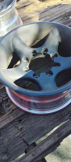 16x8 8 lug rims wheels, painted black but chrome underneath