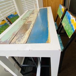 5 PIECE BAR HEIGHT TABLE  SET was $350.00 now $295.00 Rosamond, Ca.