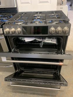 Brand new GE double oven gas range with warranty!