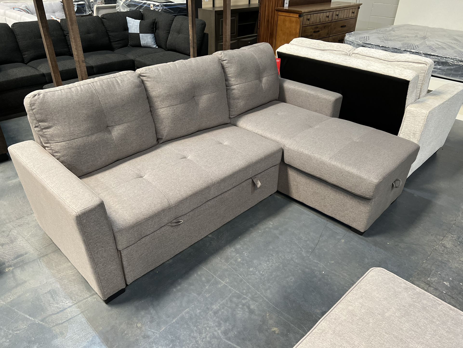 Sectional With Pull Out Bed And Storage 