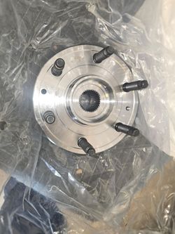 Front Wheel Hubs + Rear Drilled & Slotted Rotors