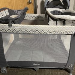 Ingenuity Smart and Simple Portable Playard with Changing Table, Play Pen, Bassinet for Infant & Storage Pockets, Easy to Fold