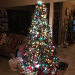 7.5” Artificial Christmas Tree (only 1 Strand of Lights Work)