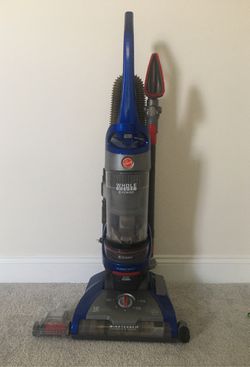 Hoover wind tunnel 2 whole house rewind bagless upright vacuum great for pets, advanced allergen block, clean from floor yo ceiling. Rarely used. 2 y