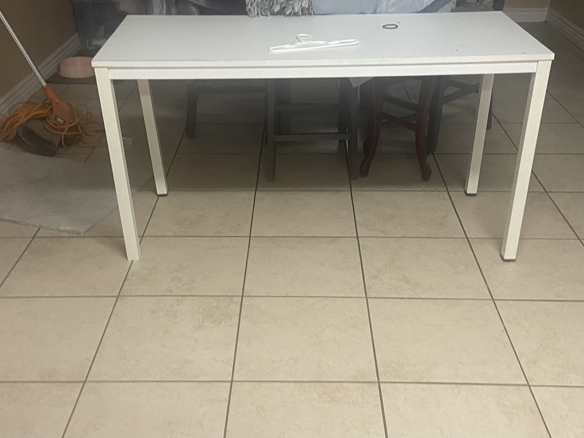 White table sturdy we used it as a vanity desk