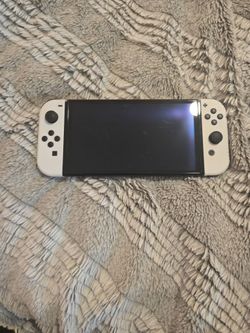 Nintendo switch 1 OLED (barely ever used)