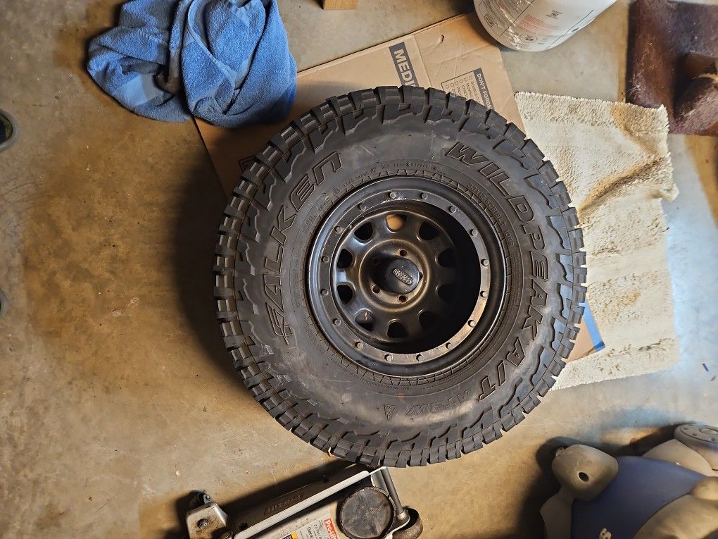 #2 of 4 Very Used Falken Wildpeak AT3W Tires with Cragar Steel Wheel