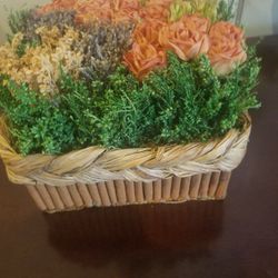 Small decorative Basket of Artificial Flowers. Woodland Hills,Ca 