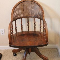 Cane backed oak Swivel chair