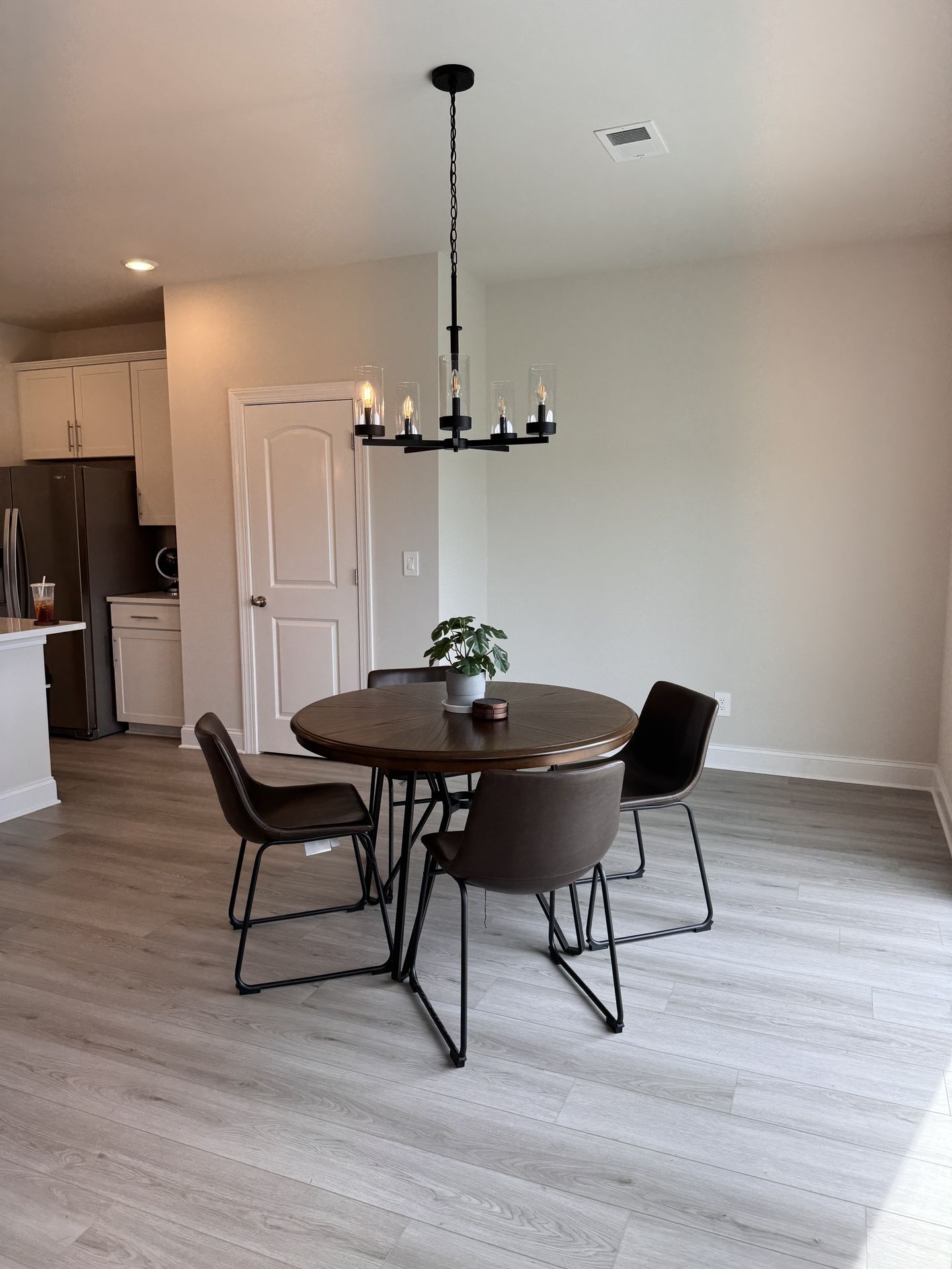 Ashley Centiar Round Dining Table with Hairpin Legs (Chairs not Included)