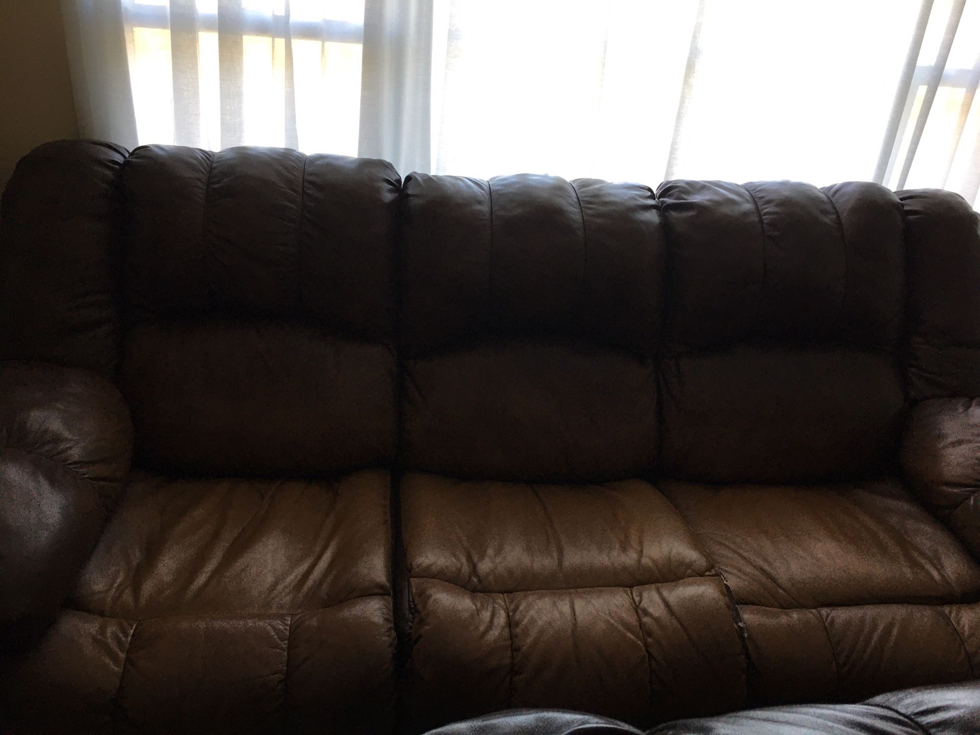Reclining, leather couch and loveseat