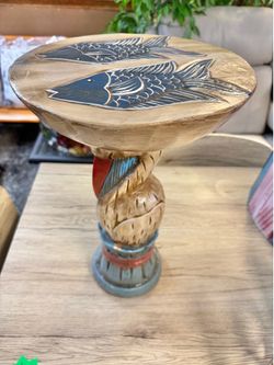 New handcrafted carved pelican accent table