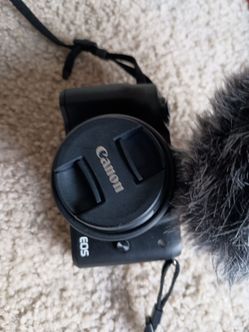 Canon EOS Mirrorless Camera with Lens