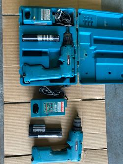 Two sets Makita drills and chargers, batteries dead